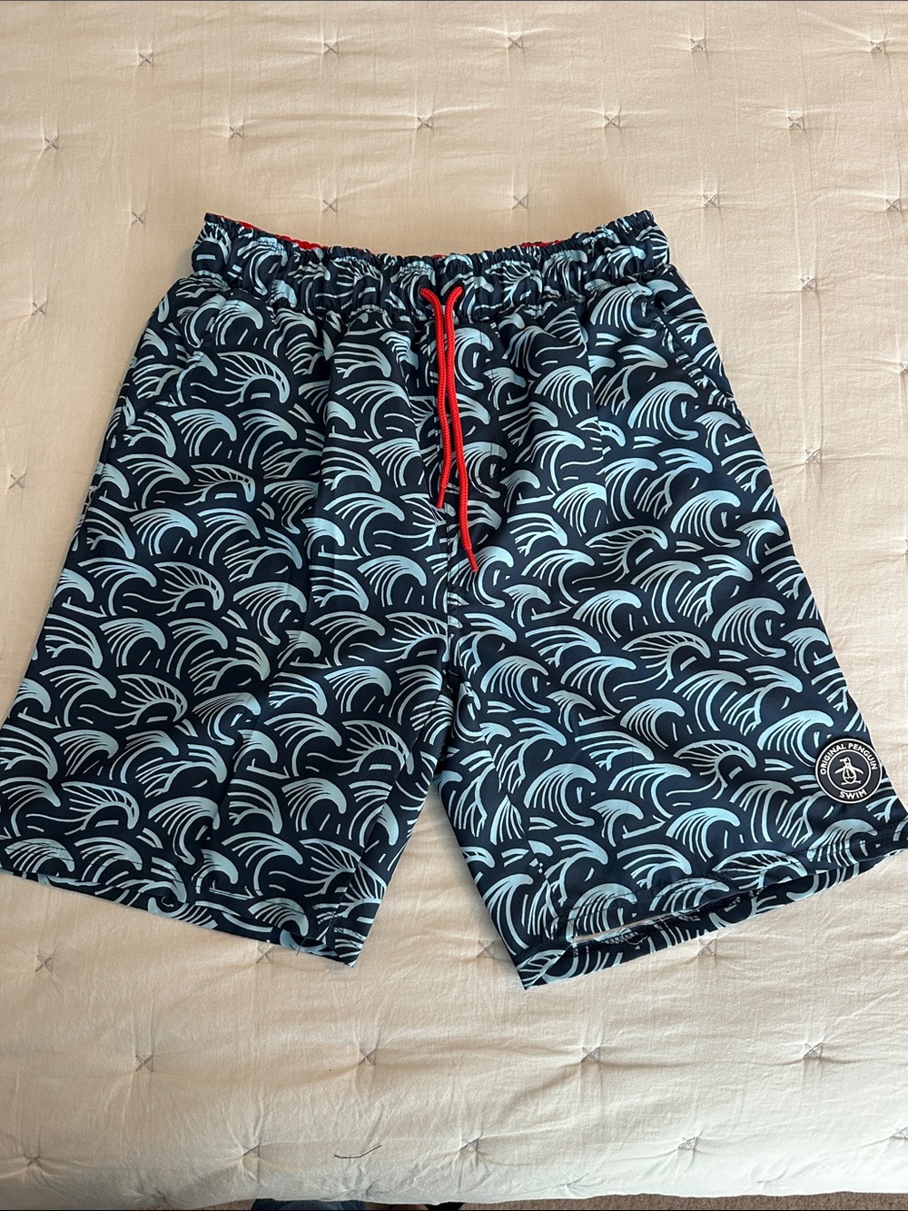 Penguin Boy’s Navy Wave-Print Swim Shorts with Red Drawstring